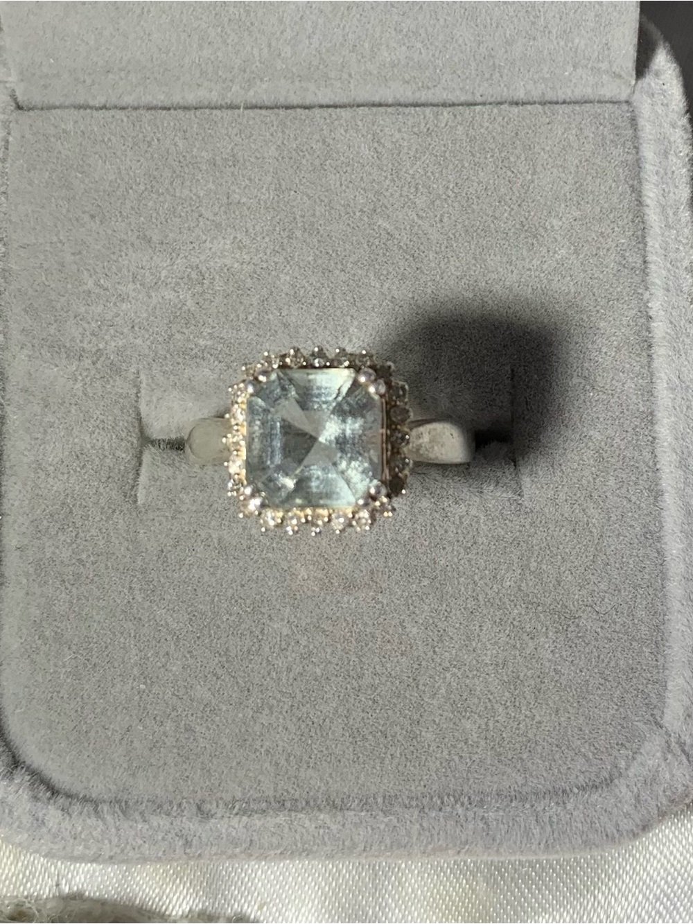 Sterling Silver Aquamarine Halo Ring - Pale Blue Center